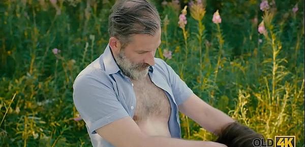  OLD4K. Handsome old man convinces busty gal to have sex in the forest